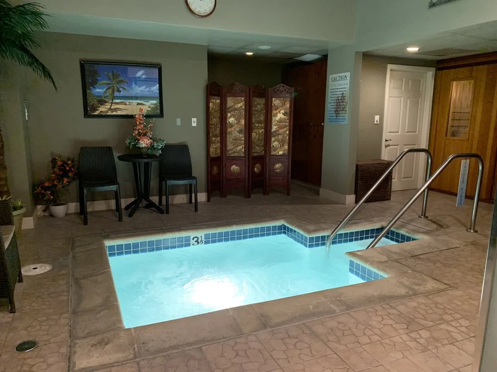 Indoor jacuzzi with seating area