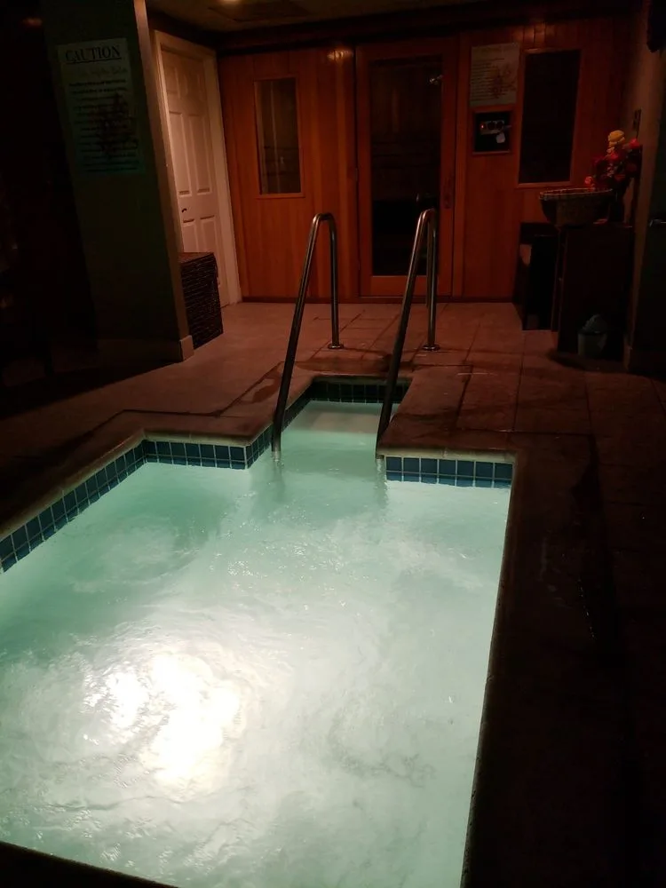 Heated jacuzzi adjacent to the sauna