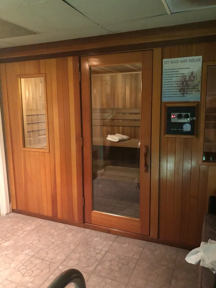 Cedar sauna entrance with viewing window