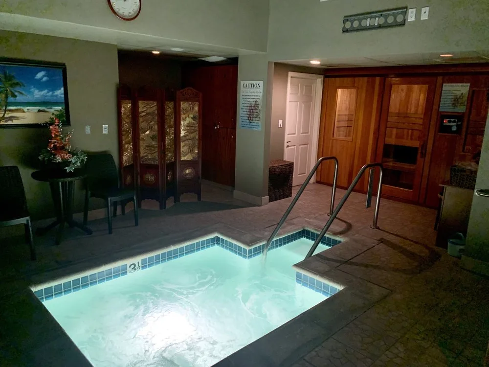 Spa hydrotherapy area with jacuzzi and sauna
