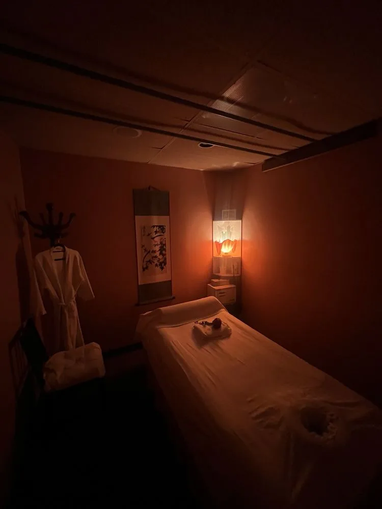 Dimly lit private massage suite